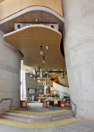 Illustration for article titled This New School of Architecture is a Crazy Canyon of Concrete and Wood